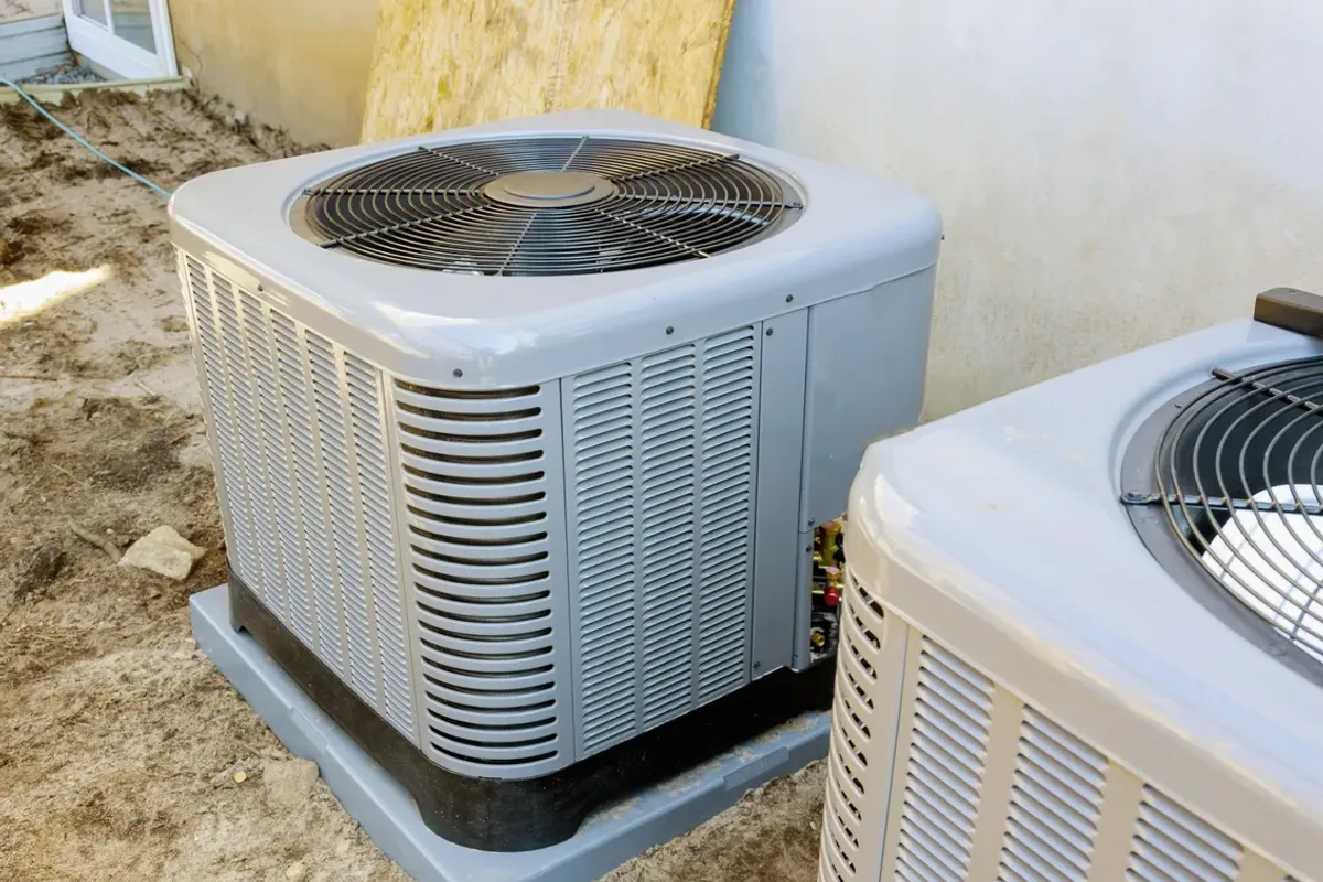 Two outdoor air conditioner condensers